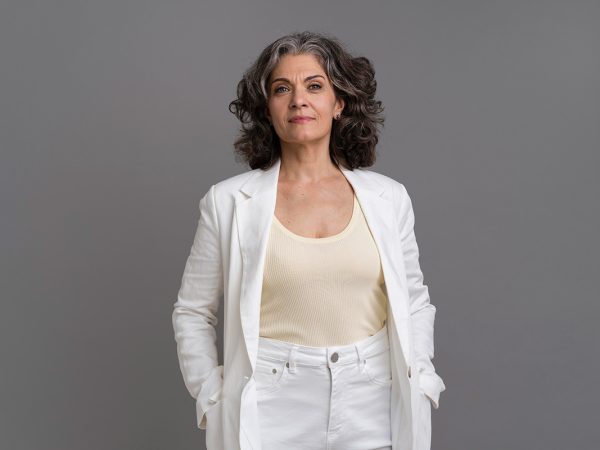 mature woman in white clothes hgh for women concept